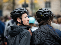 People gather at the Place de La Republique in Paris, France, on October 19, 2024, to pay tribute to Paul, a 27-year-old cyclist who dies af...