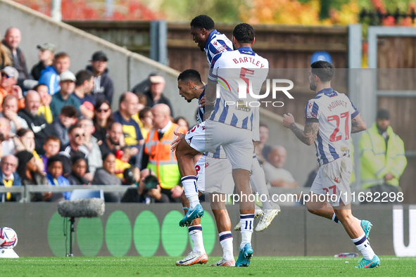 Karlan Grant of WBA is surrounded by teammates Josh Maja, Kyle Bartley, and Alex Mowatt as they celebrate the goal during the Sky Bet Champi...