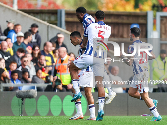 Karlan Grant of WBA is surrounded by teammates Josh Maja, Kyle Bartley, and Alex Mowatt as they celebrate the goal during the Sky Bet Champi...