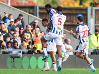 Karlan Grant of WBA is surrounded by teammates Josh Maja, Kyle Bartley, and Alex Mowatt as they celebrate the goal during the Sky Bet Champi...