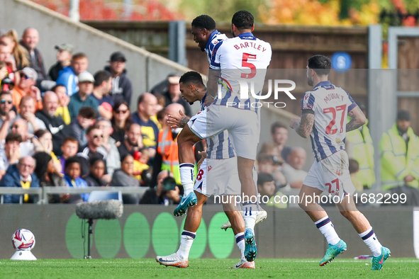 Karlan Grant of WBA is surrounded by teammates Josh Maja, Kyle Bartley, and Alex Mowatt as they celebrate the goal during the Sky Bet Champi...