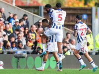 Karlan Grant of WBA is surrounded by teammates Josh Maja, Kyle Bartley, and Alex Mowatt as they celebrate the goal during the Sky Bet Champi...