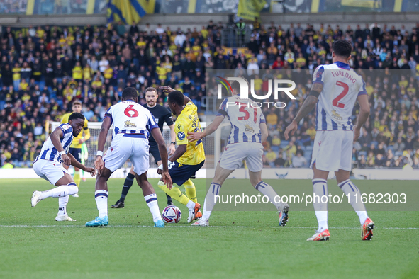 #23, Siriki Dembele of Oxford is on the ball as he attacks the West Bromwich Albion defense during the Sky Bet Championship match between Ox...