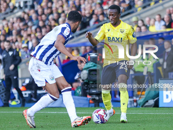 #2, Darnell Furlong of WBA shadows #23, Siriki Dembele of Oxford during the Sky Bet Championship match between Oxford United and West Bromwi...