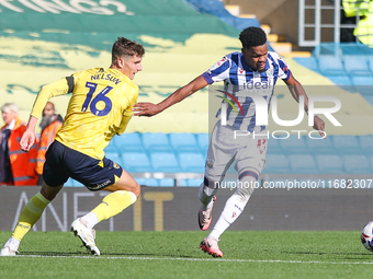 #11, Grady Diangana of WBA holds off #16, Ben Nelson of Oxford during the Sky Bet Championship match between Oxford United and West Bromwich...