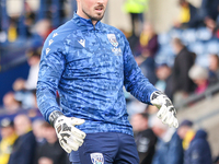 #23, Joe Wildsmith of WBA warms up during the Sky Bet Championship match between Oxford United and West Bromwich Albion at the Kassam Stadiu...