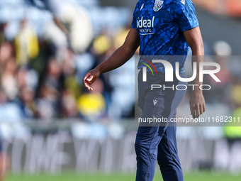 Grady Diangana of WBA warms up during the Sky Bet Championship match between Oxford United and West Bromwich Albion at the Kassam Stadium in...