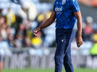 Grady Diangana of WBA warms up during the Sky Bet Championship match between Oxford United and West Bromwich Albion at the Kassam Stadium in...