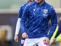 Paddy McNair of WBA warms up during the Sky Bet Championship match between Oxford United and West Bromwich Albion at the Kassam Stadium in O...