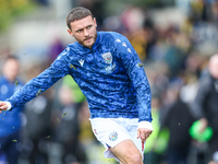 #10, John Swift of WBA warms up during the Sky Bet Championship match between Oxford United and West Bromwich Albion at the Kassam Stadium i...