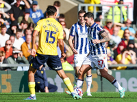 #27, Alex Mowatt of WBA is in attacking action during the Sky Bet Championship match between Oxford United and West Bromwich Albion at the K...