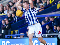 Number 14, Torbjorn Heggem of WBA, takes a throw-in during the Sky Bet Championship match between Oxford United and West Bromwich Albion at...