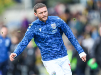 #10, John Swift of WBA warms up during the Sky Bet Championship match between Oxford United and West Bromwich Albion at the Kassam Stadium i...