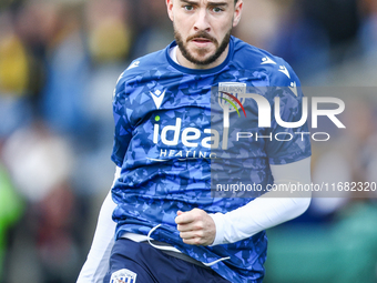 Mikey Johnston of WBA warms up during the Sky Bet Championship match between Oxford United and West Bromwich Albion at the Kassam Stadium in...