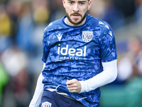 Mikey Johnston of WBA warms up during the Sky Bet Championship match between Oxford United and West Bromwich Albion at the Kassam Stadium in...