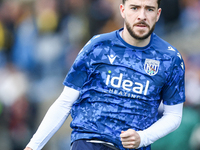 Mikey Johnston of WBA warms up during the Sky Bet Championship match between Oxford United and West Bromwich Albion at the Kassam Stadium in...