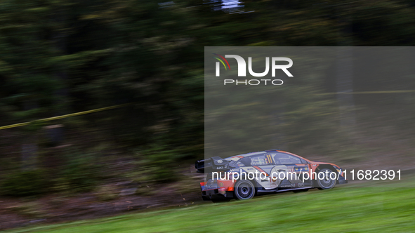 Driver Thierry Neuville and co-driver Martijn Wydaeghe of the Hyundai Shell Mobis World Rally Team, in a Hyundai I20 N Rally1 Hybrid, face t...