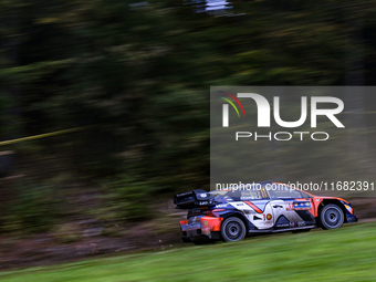 Driver Thierry Neuville and co-driver Martijn Wydaeghe of the Hyundai Shell Mobis World Rally Team, in a Hyundai I20 N Rally1 Hybrid, face t...