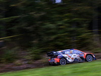 Driver Thierry Neuville and co-driver Martijn Wydaeghe of the Hyundai Shell Mobis World Rally Team, in a Hyundai I20 N Rally1 Hybrid, face t...