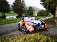 Driver Thierry Neuville and co-driver Martijn Wydaeghe of the Hyundai Shell Mobis World Rally Team, in a Hyundai I20 N Rally1 Hybrid, face t...