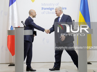 In Kyiv, Ukraine, on October 19, 2024, the Minister of Foreign Affairs of Ukraine, Andrii Sybiha, shakes hands with the Minister for Europe...