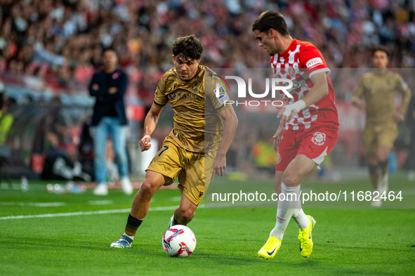 Jon Mikel Aramburu of Real Sociedad is in action during the LaLiga EA Sports 2024-2025 match between Girona FC and Real Sociedad at Montiliv...