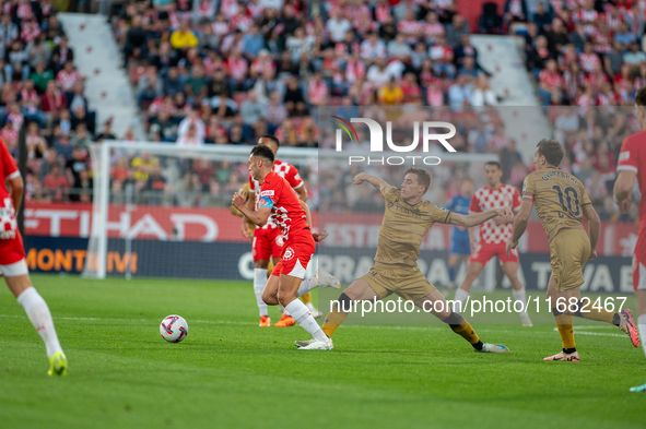 Players are in action during the LaLiga EA Sports 2024 - 2025 match between Girona FC and Real Sociedad at Montilivi Stadium in Girona, Spai...