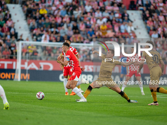 Players are in action during the LaLiga EA Sports 2024 - 2025 match between Girona FC and Real Sociedad at Montilivi Stadium in Girona, Spai...