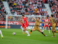 Players are in action during the LaLiga EA Sports 2024 - 2025 match between Girona FC and Real Sociedad at Montilivi Stadium in Girona, Spai...