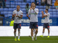 Josh Dacres-Cogley #12 of Bolton Wanderers F.C. applauds at full time during the Sky Bet League 1 match between Bolton Wanderers and Burton...