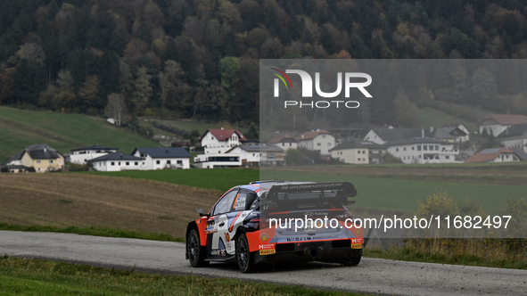 Driver Ott Tanak and co-driver Martin Jarveoja of the Hyundai Shell Mobis World Rally Team, in a Hyundai i20 N Rally1 Hybrid, face the third...