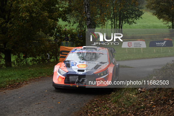 Driver Ott Tanak and co-driver Martin Jarveoja of the Hyundai Shell Mobis World Rally Team, in a Hyundai i20 N Rally1 Hybrid, face the third...