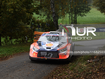 Driver Ott Tanak and co-driver Martin Jarveoja of the Hyundai Shell Mobis World Rally Team, in a Hyundai i20 N Rally1 Hybrid, face the third...