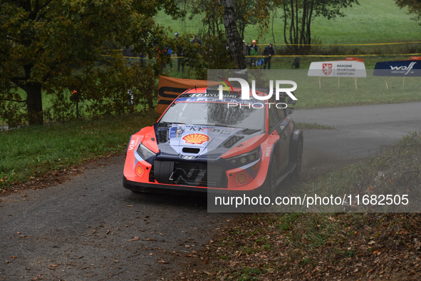 Driver Thierry Neuville and co-driver Martijn Wydaeghe of the Hyundai Shell Mobis World Rally Team, in a Hyundai I20 N Rally1 Hybrid, face t...