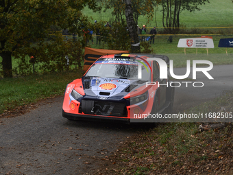 Driver Thierry Neuville and co-driver Martijn Wydaeghe of the Hyundai Shell Mobis World Rally Team, in a Hyundai I20 N Rally1 Hybrid, face t...