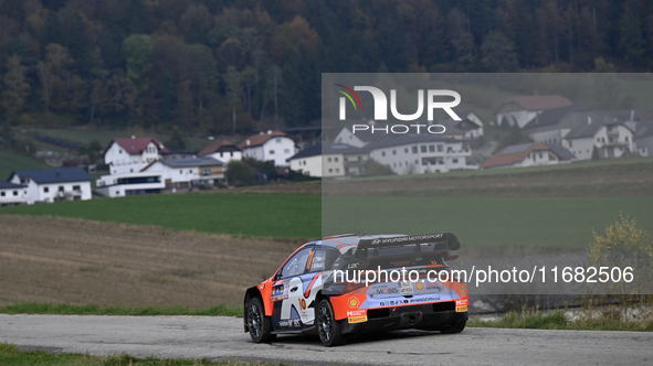 Driver Thierry Neuville and co-driver Martijn Wydaeghe of the Hyundai Shell Mobis World Rally Team, in a Hyundai I20 N Rally1 Hybrid, face t...