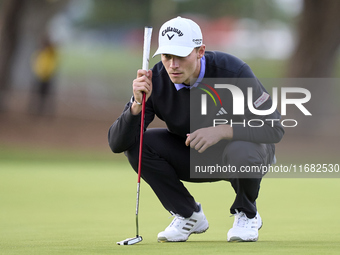 In San Roque, Spain, on October 19, 2024, Nicolai Hojgaard of Denmark studies his shot on the 1st green on the third day of the Estrella Dam...