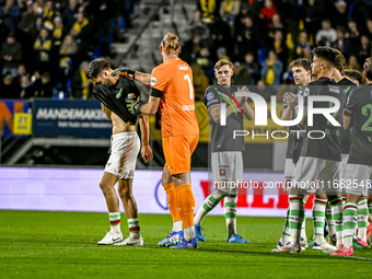 FC Twente forward Ricky van Wolfswinkel and FC Twente goalkeeper Lars Unnerstall participate in the match RKC - Twente at the Mandemakers St...