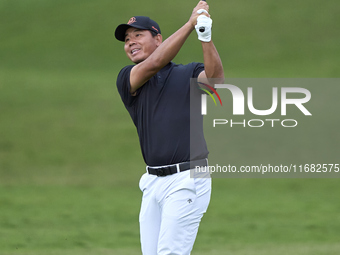 Ashun Wu of China plays his second shot on the 1st hole on the third day of the Estrella Damm N.A. Andalucia Masters 2024 at Real Club de Go...