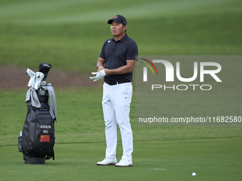 Ashun Wu of China reacts on the 1st hole on the third day of the Estrella Damm N.A. Andalucia Masters 2024 at Real Club de Golf Sotogrande i...