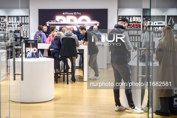  IPhone 16 Pro ad is seen at iSpot store in a shopping mall in Krakow, Poland on October 19th, 2024. 