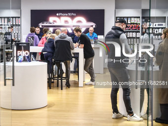  IPhone 16 Pro ad is seen at iSpot store in a shopping mall in Krakow, Poland on October 19th, 2024. (