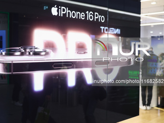  IPhone 16 Pro ad is seen at iSpot store in a shopping mall in Krakow, Poland on October 19th, 2024. (