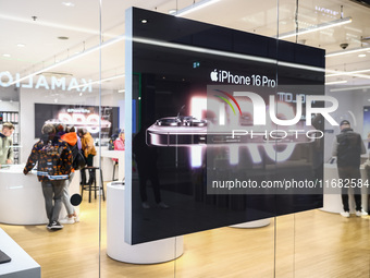  IPhone 16 Pro ad is seen at iSpot store in a shopping mall in Krakow, Poland on October 19th, 2024. (