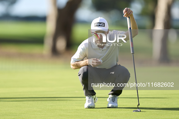 Rasmus Neergaard-Petersen of Denmark studies his shot on the 1st green on the third day of the Estrella Damm N.A. Andalucia Masters 2024 at...