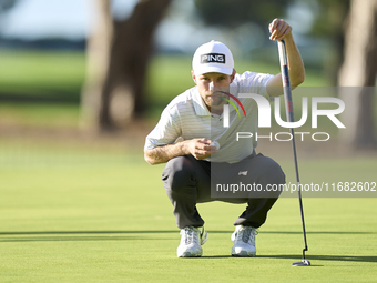 Rasmus Neergaard-Petersen of Denmark studies his shot on the 1st green on the third day of the Estrella Damm N.A. Andalucia Masters 2024 at...