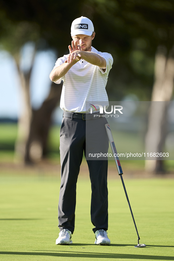 Rasmus Neergaard-Petersen of Denmark studies his shot on the 1st green on the third day of the Estrella Damm N.A. Andalucia Masters 2024 at...