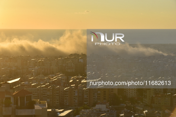 Black smoke billows from Beirut's southern suburb following heavy Israeli air raids on the pro-Iranian Hezbollah stronghold in Beirut, Leban...