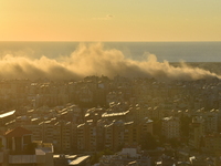 Black smoke billows from Beirut's southern suburb following heavy Israeli air raids on the pro-Iranian Hezbollah stronghold in Beirut, Leban...