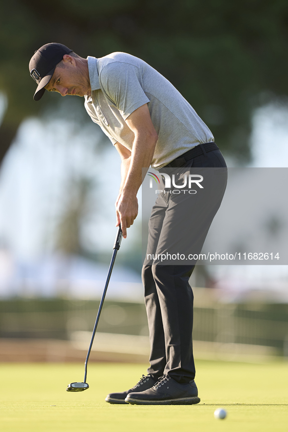 Ross Fisher of England plays a shot on the 1st green on the third day of the Estrella Damm N.A. Andalucia Masters 2024 at Real Club de Golf...